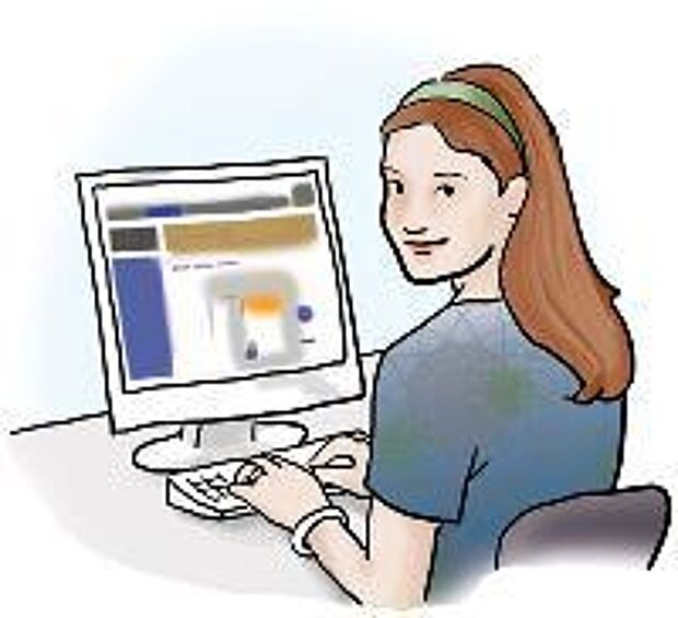 junger Frau sitzt vor einem Rechner